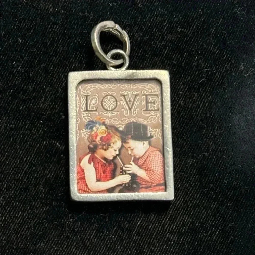 Pick up Sticks Jewelry Love Charm.  No longer available for purchase!!